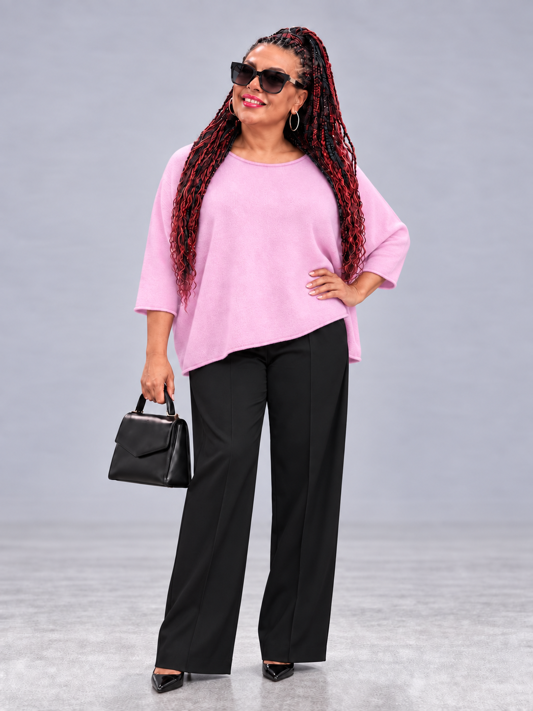 Oversize-Strickpullover mit leichtem Rollsaum – Bild 2