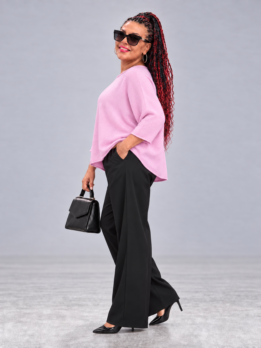 Oversize-Strickpullover mit leichtem Rollsaum – Bild 4